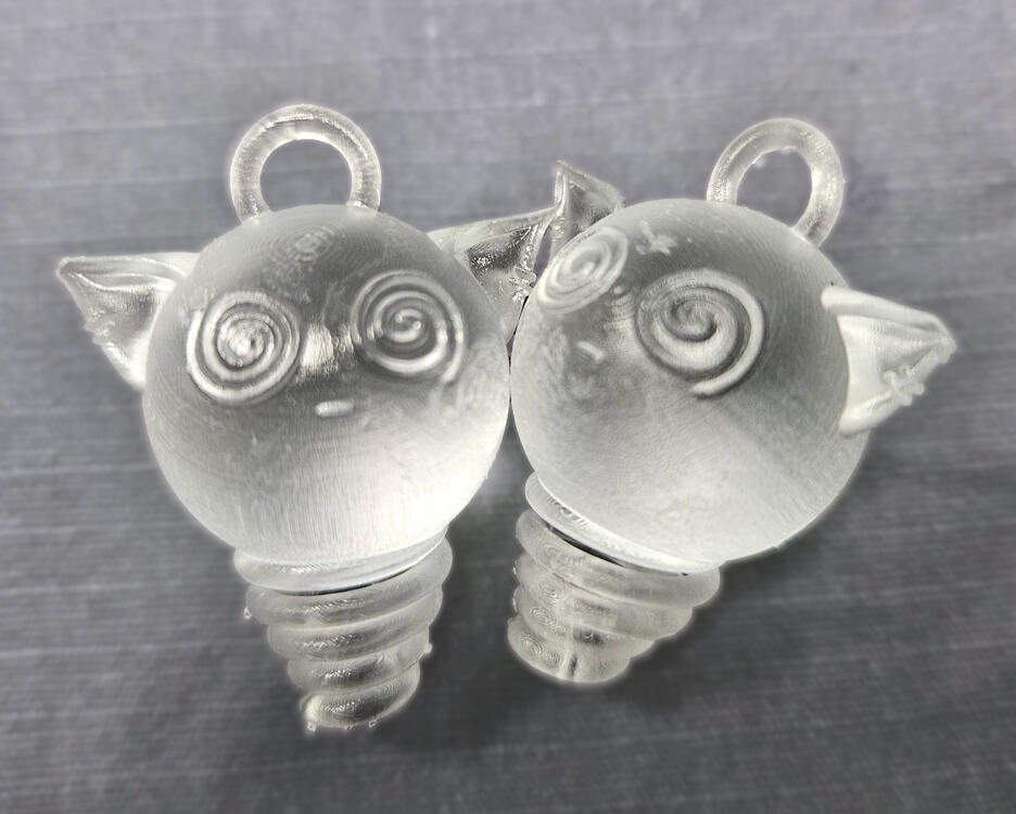 3D prints in SLA Clear Resin with supports removed.